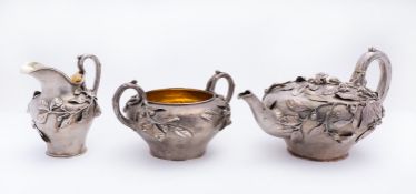 A William VI silver three piece tea service by Benjamin Smith III, London 1831,