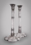 A pair of George III Gothic silver candlesticks by Thomas Hammond & John Carter, London 1774,