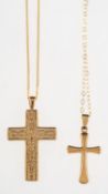Two cross pendants with chains, including a 9ct gold cross, ornately carved with Roman numerals,