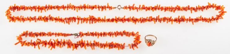 A 9ct gold coral ring and two coral necklaces,