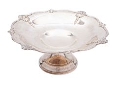 An Elizabeth II silver tazza by Walker and Hall, Sheffield 1961, of shaped circular form,