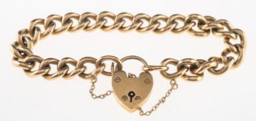 A 9ct gold charm bracelet, with heart padlock and safety chain, heart padlock UK hallmark,