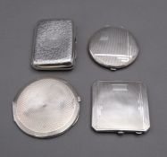 A mixed group of silver compacts including;
