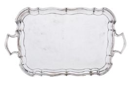 An Edward VIII silver two handled tray by Viner's Ltd, Sheffield 1933, of shaped rectangular form,