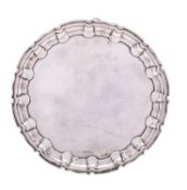 An Edward VII silver waiter by William Hutton & Sons Ltd, London 1905, of circular form,