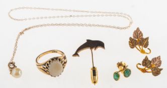 A mixed group of jewellery, including a pair of stud earrings set with an oval-cut emerald cabochon,
