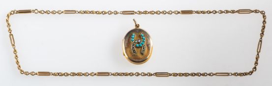 A turquoise and seed pearl locket and a fancy-link chain,