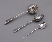 A mixed group of silver spoons including; an 18th century mote spoon maker's mark poorly struck,