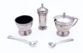 An Elizabeth II silver three piece cruet by A Chick & Sons Ltd, London 1963, with blue glass liners,