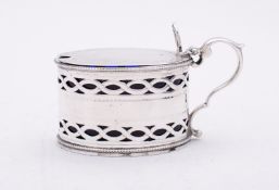 A Victorian silver and glass mustard pot by Henry Holland, London 1874, of oval form,