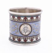 An Imperial Russian silver gilt and champleve enamel ring possibly by Ivan Khlebnikow,