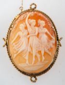 A cameo brooch, a carved shell cameo brooch depicting the Three Grace's,