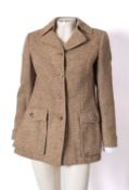Burberry, London, a lady's tweed wool jacket.