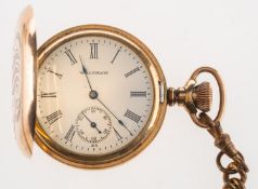 Waltham a gold-plated full-hunter pocket watch the white enamel dial having black Roman numerals,