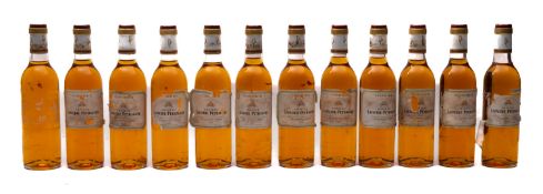 Twelve bottles of La Fuarie Peyraghey and a half bottle of 1/2 1994 Sauternes.