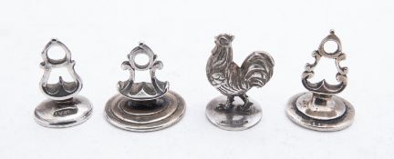 A group of silver fob seals including; a miniature chicken by Dennison, Wigley & Co,
