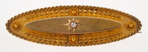 A 15ct gold early 20th century mourning brooch, of ornate oval design,