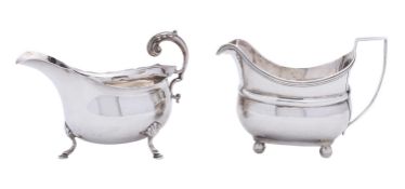 A George III silver cream jug maker's mark rubbed out, London 1807,