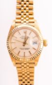 Rolex Datejust an 18ct gold lady's wristwatch the dial with raised baton numerals, baton hands,