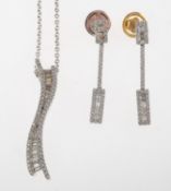 A diamond pendant with chain and a pair of diamond earrings,