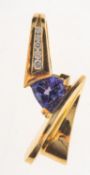 A tanzanite and diamond pendant, of modernist form,