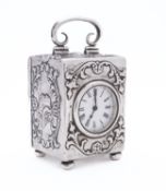 An Edward VII silver carriage clock by William Comyns & Sons, London 1900,