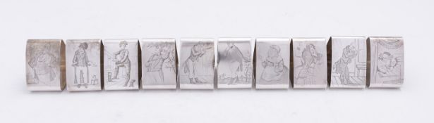 A silver Victorian silver triangular napkin ring by Walker and Hall, 1895,