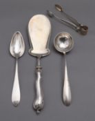 A mixed group of Continental silver flatware including; a Danish silver cake slice by A.