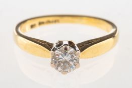 A diamond solitaire ring, claw set with a single brilliant-cut diamond, diamond approx. 0.