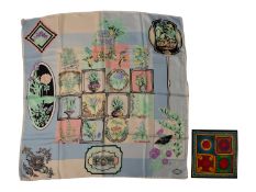 An Atelier Versace silk scarf 'Historia Botanico-Practico' in original card case, 88x 88cm.
