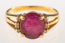 An 18ct gold ruby and diamond ring,
