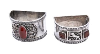 Two Arts and Crafts silver and gemset D shaped napkin rings by Amy Sandheim, London,