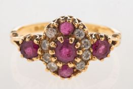 An 18ct gold ruby and diamond cluster ring,