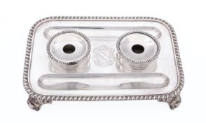 A George IV silver inkstand by WE, London 1824, of rounded rectangular form,