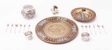 A group of Indian metalwares including; a Swami white metal pot and cover stamped 85 on the lid,