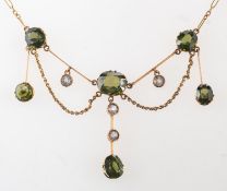 An Edwardian Belle Epoque necklace, a fancy open-link chain leading to bar sections,