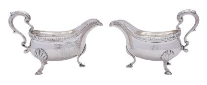 A pair of George III silver sauce boats by William Skeen, London 1775, marks rubbed,