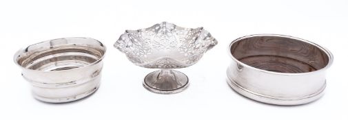 An Elizabeth II silver decanter coaster by E S & Co marks rubbed, Birmingham 1987,