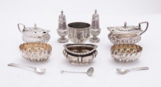 A mixed group of silver including; an Edward VII egg cup with embossed decoration,