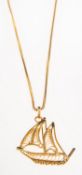 A boat pendant with chain, an openwork filigree pendant in the form of a sailing boat,