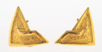 A pair of triangular shaped earrings, with a polished and textured finish,