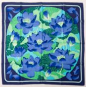 Hermes. A silk Hermes scarf, Fleures de Lotus by Christene Vauzelles 1961, blue and green, approx.