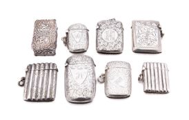 A small collection of silver vesta cases including; a presentation vesta case by J.R.