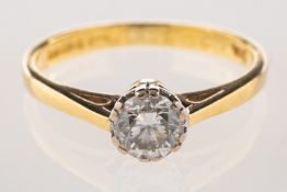 An 18ct gold diamond solitaire ring, claw set with a brilliant-cut diamond, diamond approx. 0.