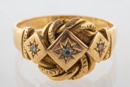 An early 20th century 18ct gold and diamond ring, an ornately designed ring,