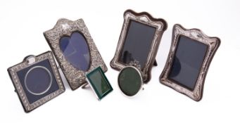 A mixed group of silver photograph frames;