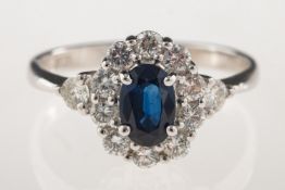 A sapphire and diamond cluster ring,