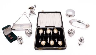 A mixed group of silver including; a cased set of six apostle coffee spoons by W.