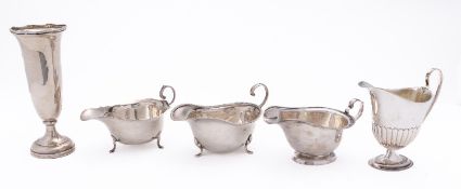 A mixed group of silver including; a helmet shaped cream jug by W W Harrison & Co, Sheffield 1900,