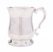 An Elizabeth II silver mug by Viner's Ltd, Sheffield 1955, of baluster form with C scroll handle,